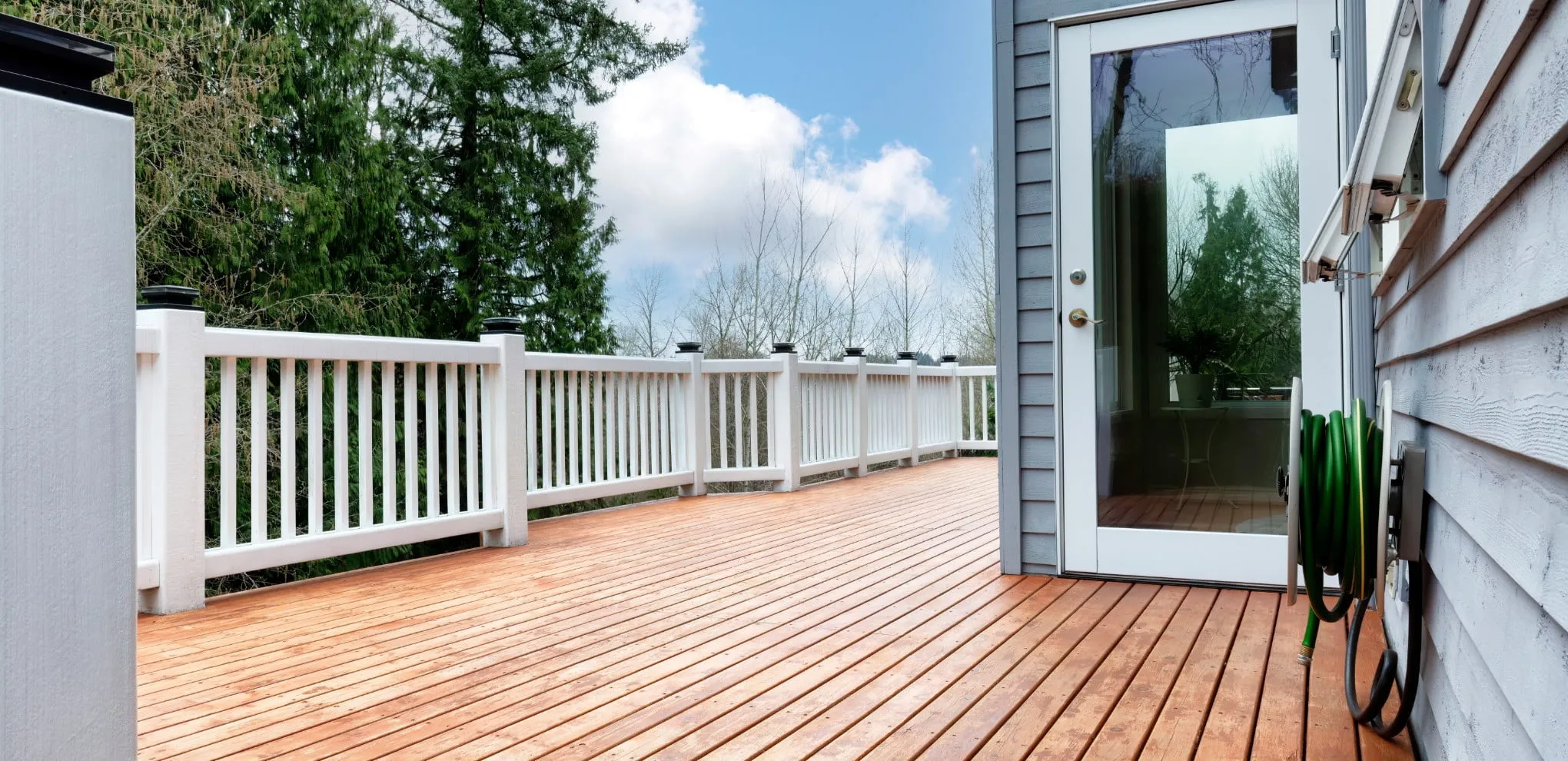 a picture of a deck with a railing all installed